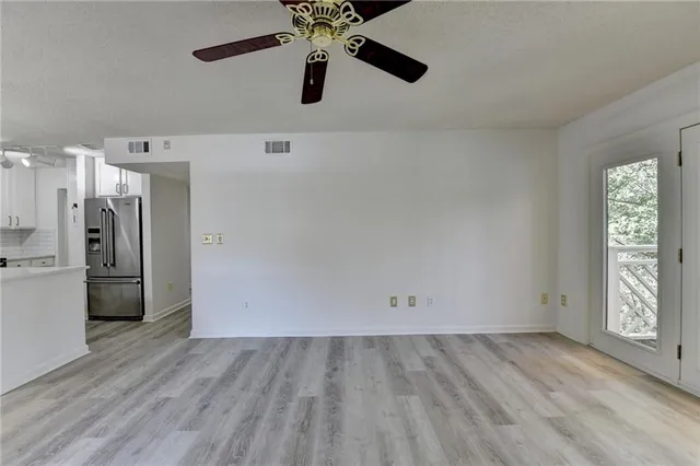 a kitchen with a stove and a microwave