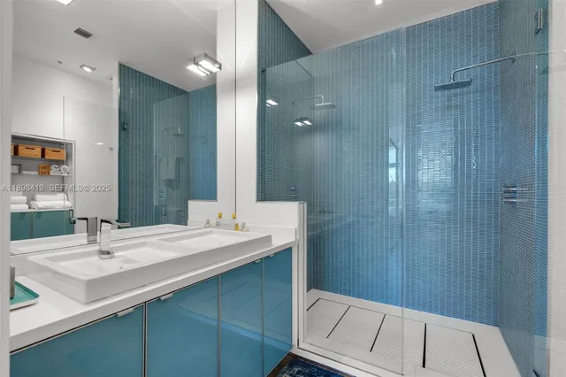 a room with a wooden floor and a sink