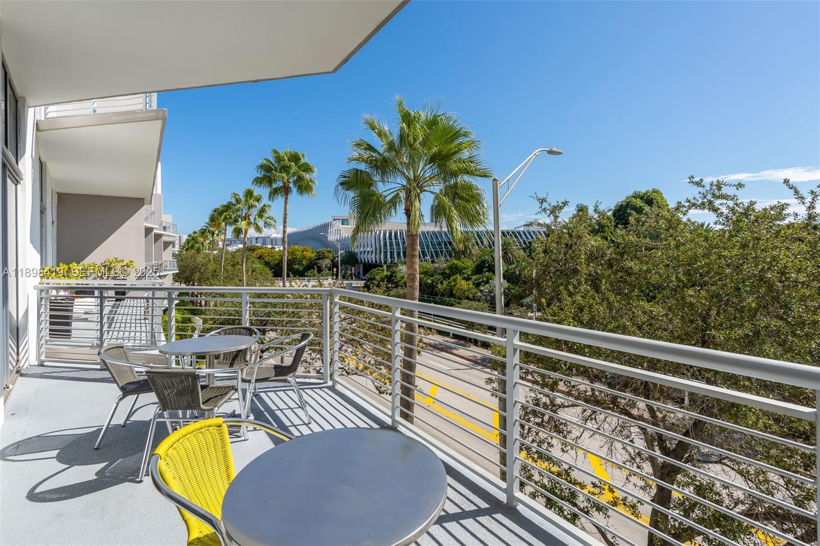 2001 Meridian Avenue, Unit 404 Miami Beach, FL 33139 - Photo 31 of 46 a view of a swimming pool with a seating space