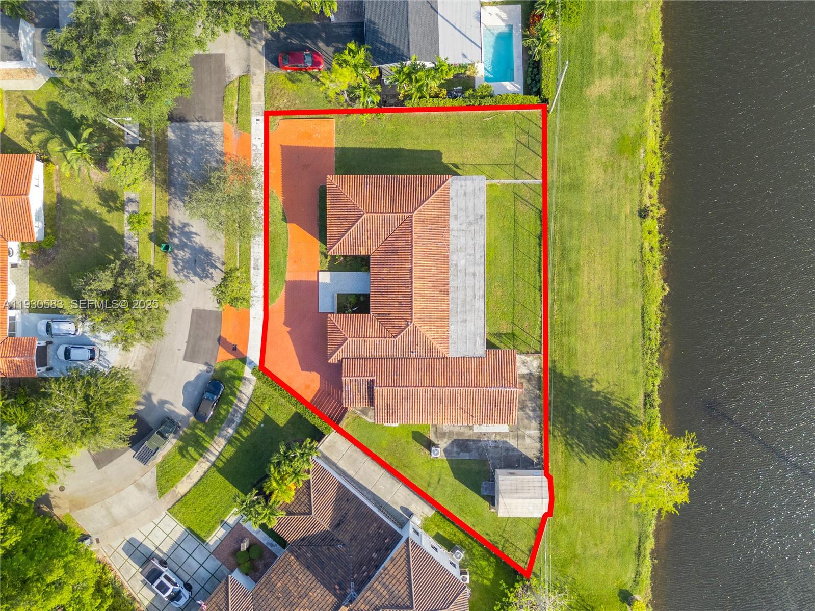 an aerial view of a house with a garden