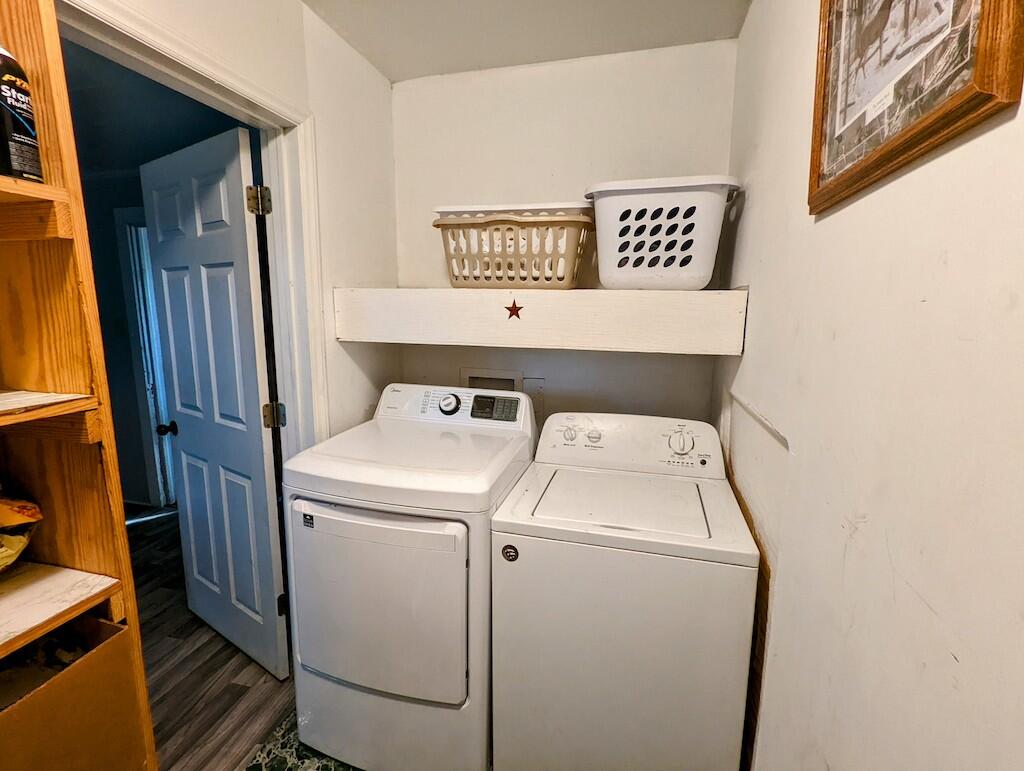 825 Macks Mountain Road Northwest Indian Valley, VA 24105 - Photo 12 of 30 a utility room with dryer and washer