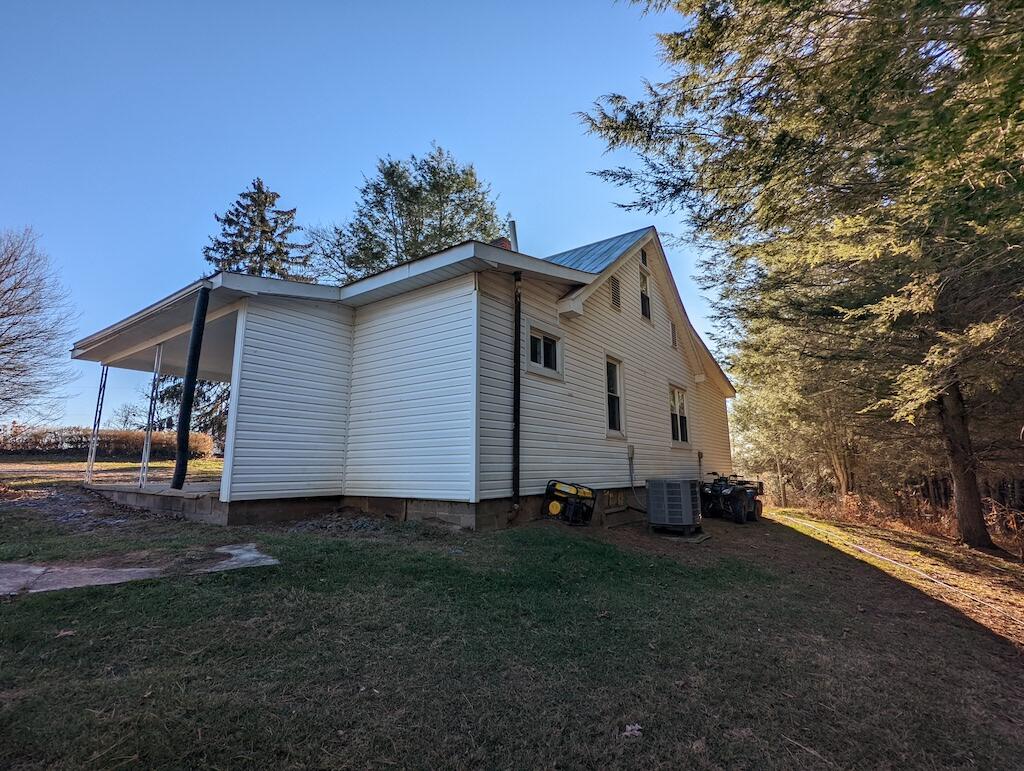 825 Macks Mountain Road Northwest Indian Valley, VA 24105 - Photo 27 of 30 a view of a house with a yard