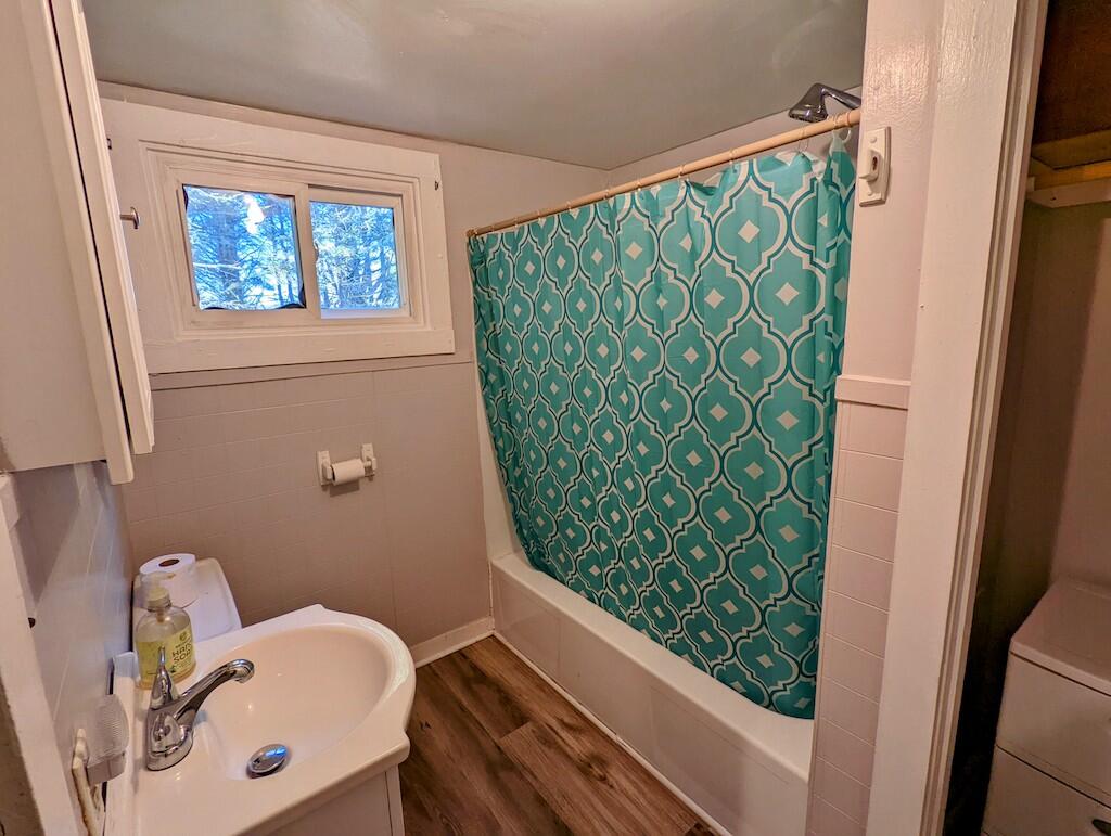825 Macks Mountain Road Northwest Indian Valley, VA 24105 - Photo 8 of 30 a bathroom with a window and mirror