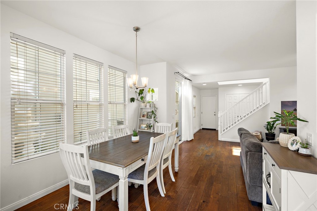 15 Honey Tree Ladera Ranch, CA 92694 - Photo 17 of 51 a view of a dining room with furniture window and wooden floor