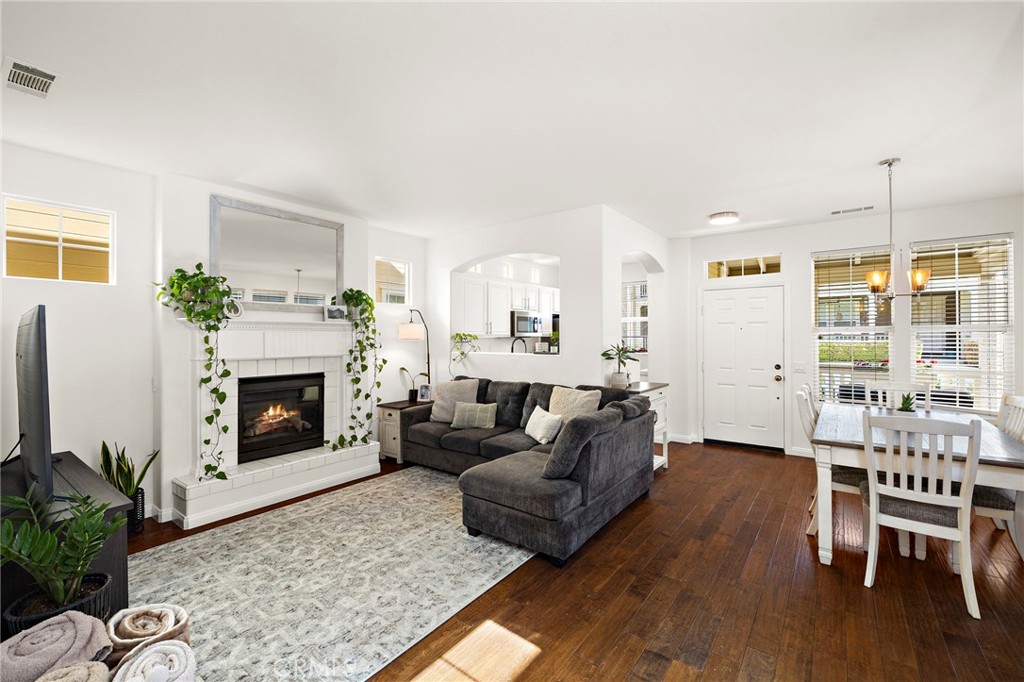 15 Honey Tree Ladera Ranch, CA 92694 - Photo 22 of 51 a living room with furniture and a fireplace