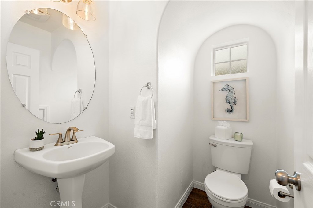 15 Honey Tree Ladera Ranch, CA 92694 - Photo 24 of 51 a bathroom with a toilet a sink and mirror