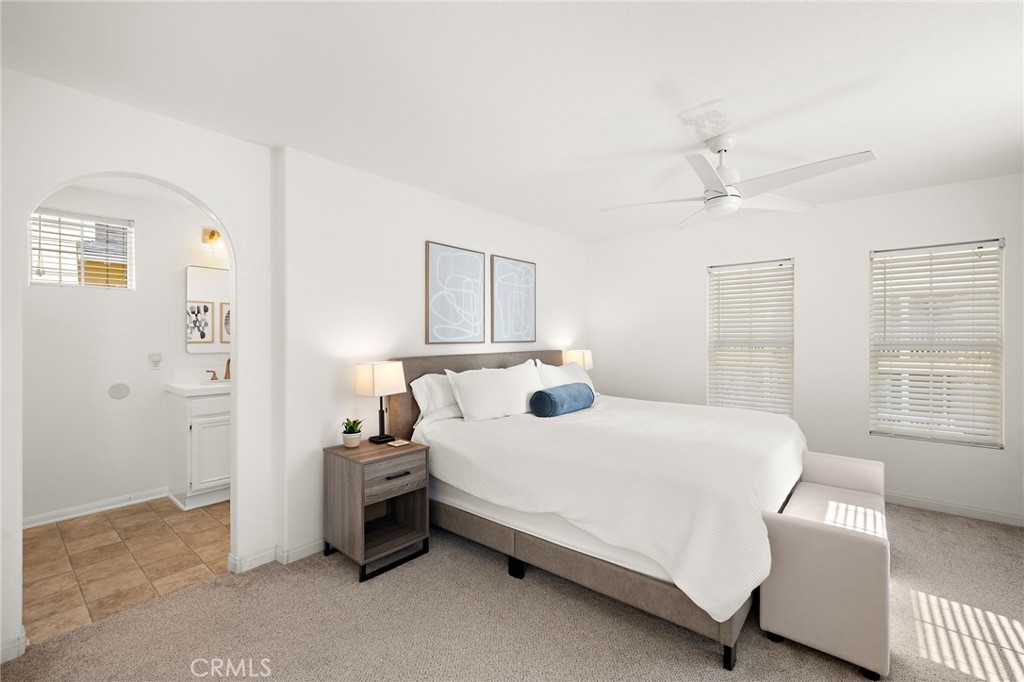 15 Honey Tree Ladera Ranch, CA 92694 - Photo 25 of 51 a bedroom with a bed and a window