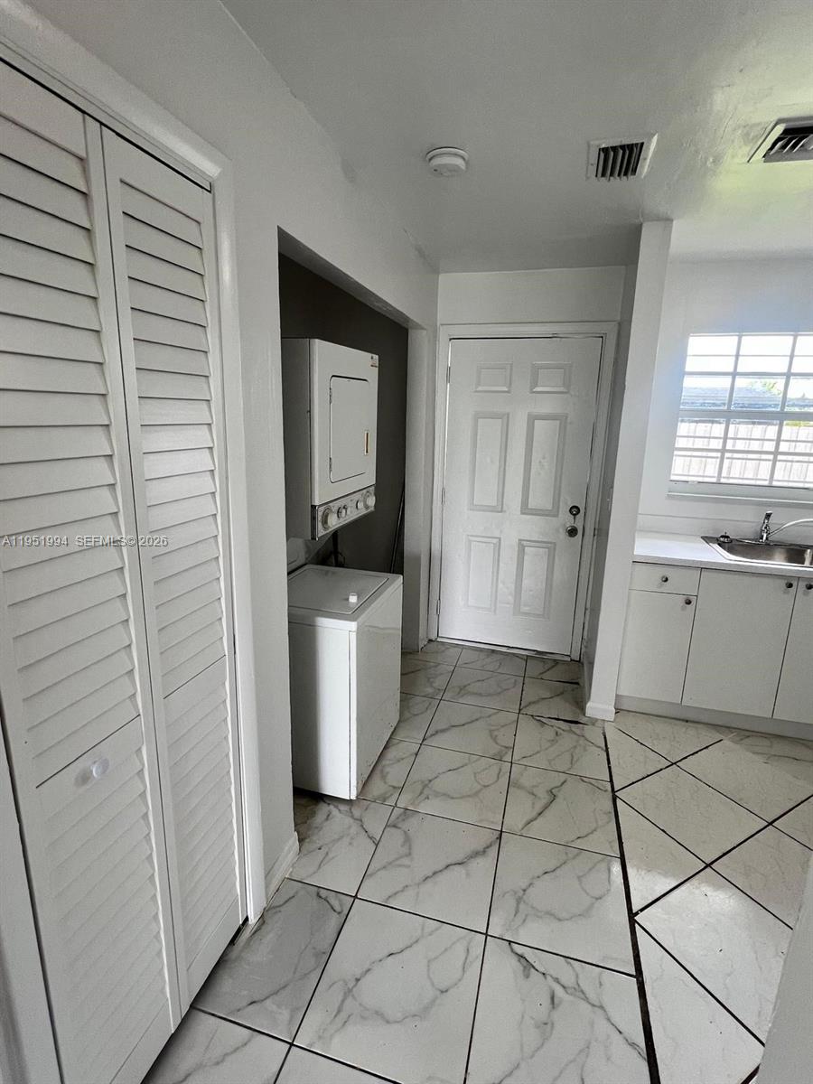 11535 Southwest 224th Street, Unit 2 Miami, FL 33170 - Photo 15 of 22 a view of a kitchen with a sink