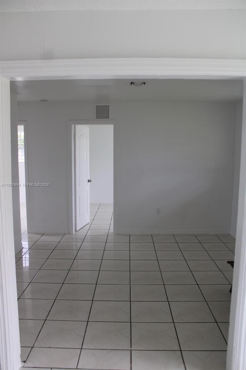 11535 Southwest 224th Street, Unit 2 Miami, FL 33170 - Photo 18 of 22 a view of an empty room
