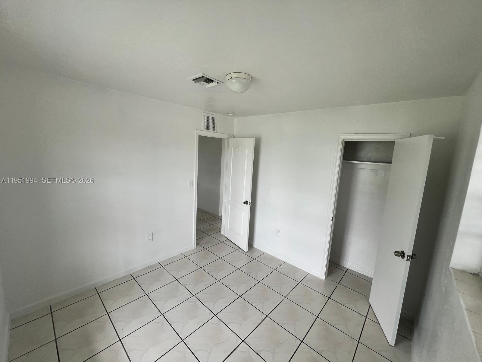 11535 Southwest 224th Street, Unit 2 Miami, FL 33170 - Photo 10 of 22 a view of an empty room