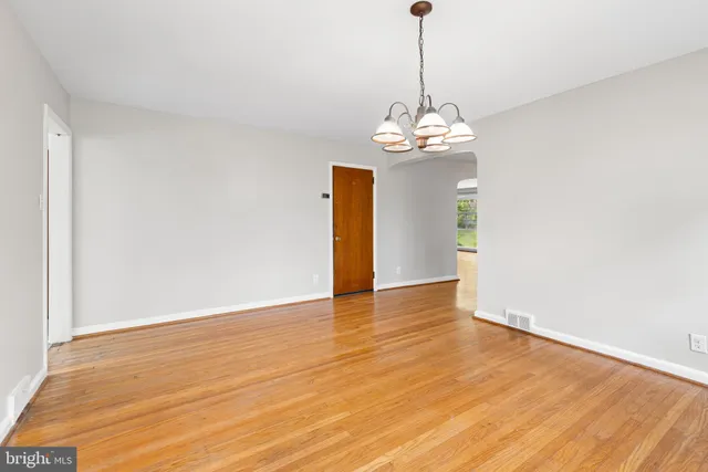 a kitchen with stainless steel appliances a refrigerator sink and cabinets