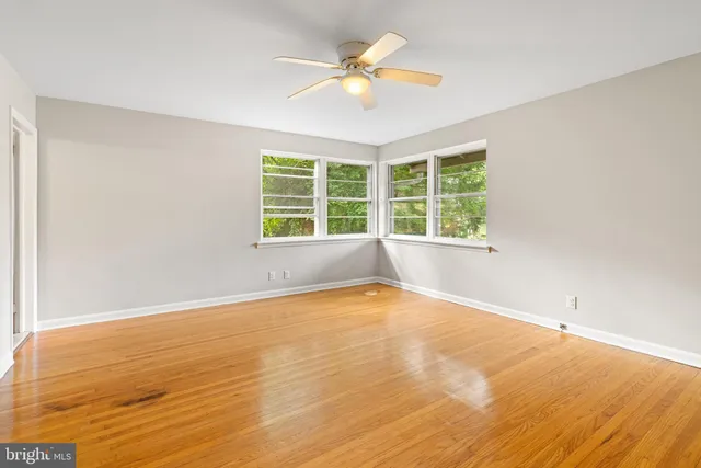 a bedroom with a large bed and a couch