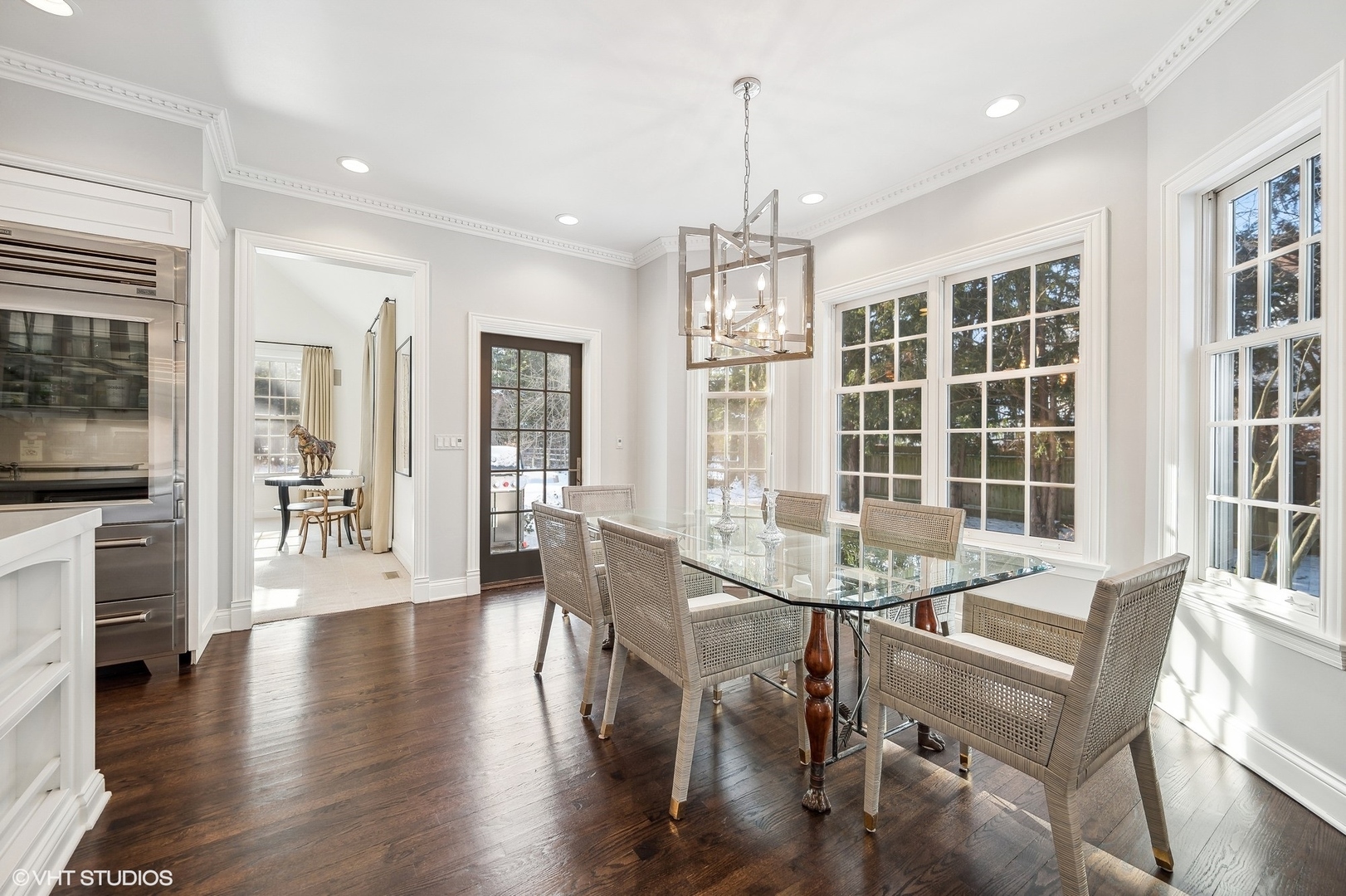 72 Woodley Road Winnetka, IL 60093 - Photo 28 of 65 a view of a dining room with furniture window and wooden floor