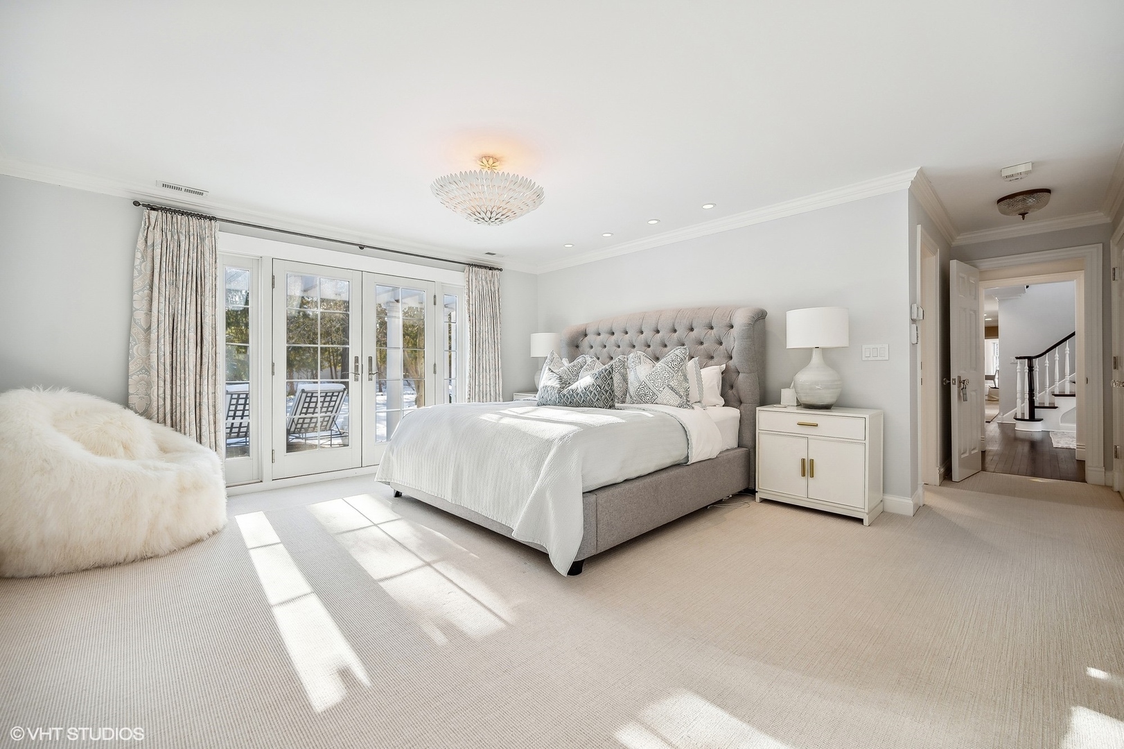 72 Woodley Road Winnetka, IL 60093 - Photo 35 of 65 a bed room with a bed and a large window