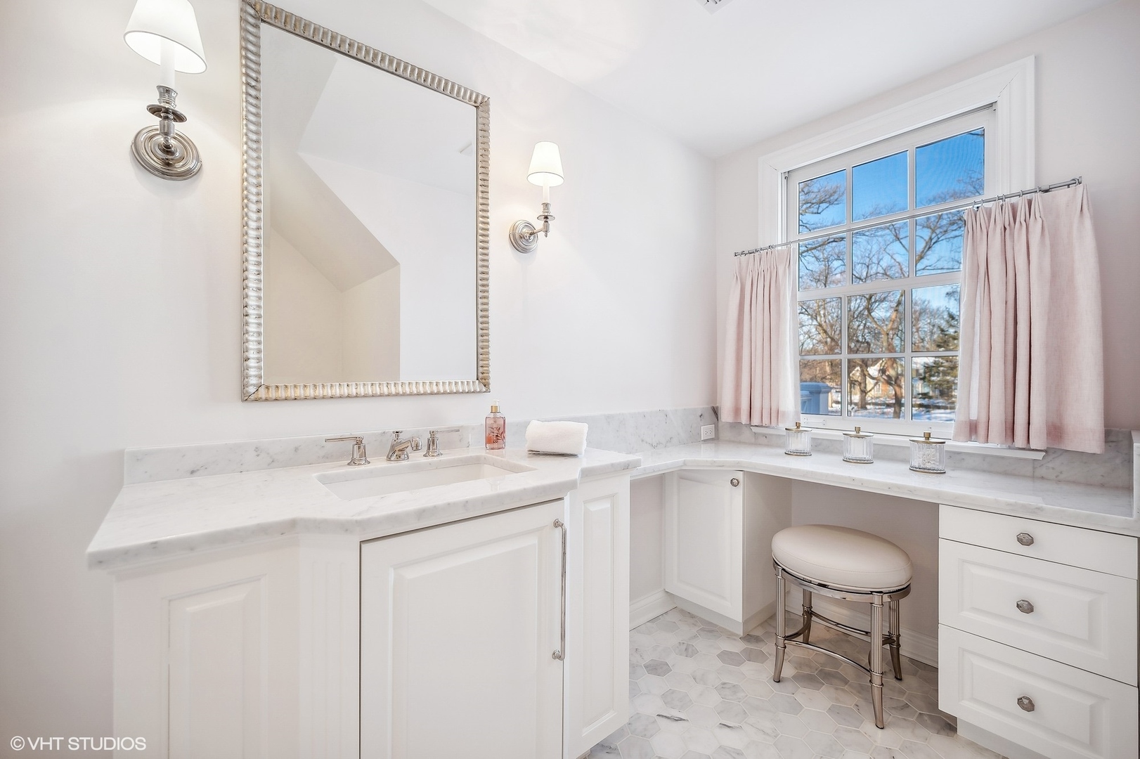 72 Woodley Road Winnetka, IL 60093 - Photo 47 of 65 a bathroom with a sink and a mirror