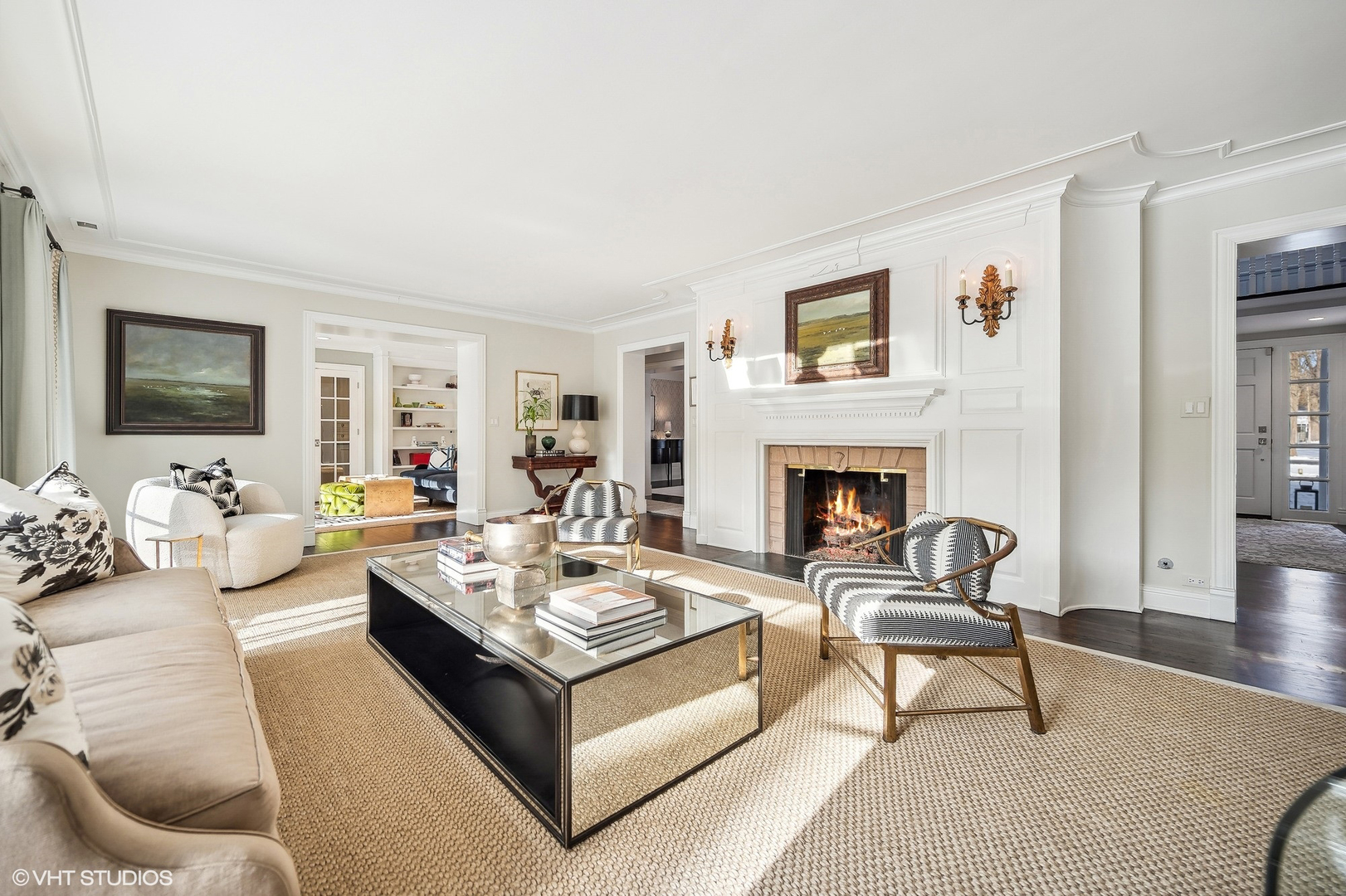 72 Woodley Road Winnetka, IL 60093 - Photo 7 of 65 a living room with furniture and a fireplace
