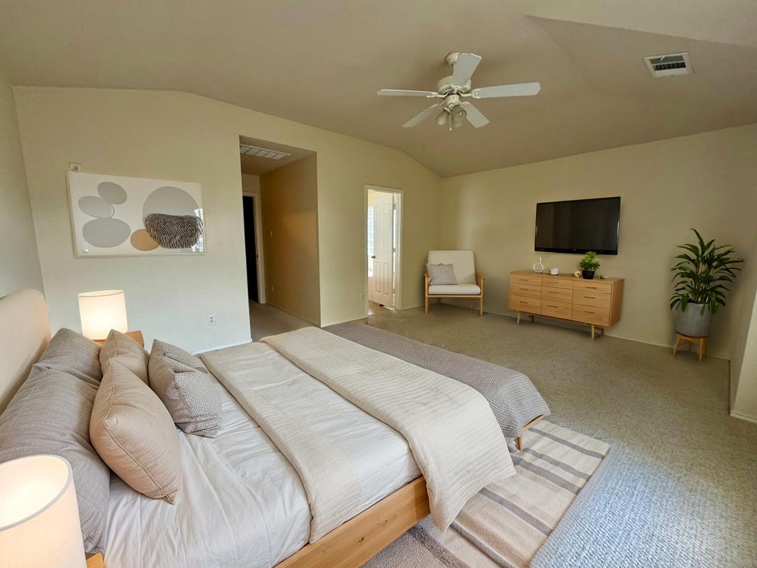 8301 Winterstein Drive Austin, TX 78745 - Photo 17 of 25 a bedroom with a bed and a chandelier