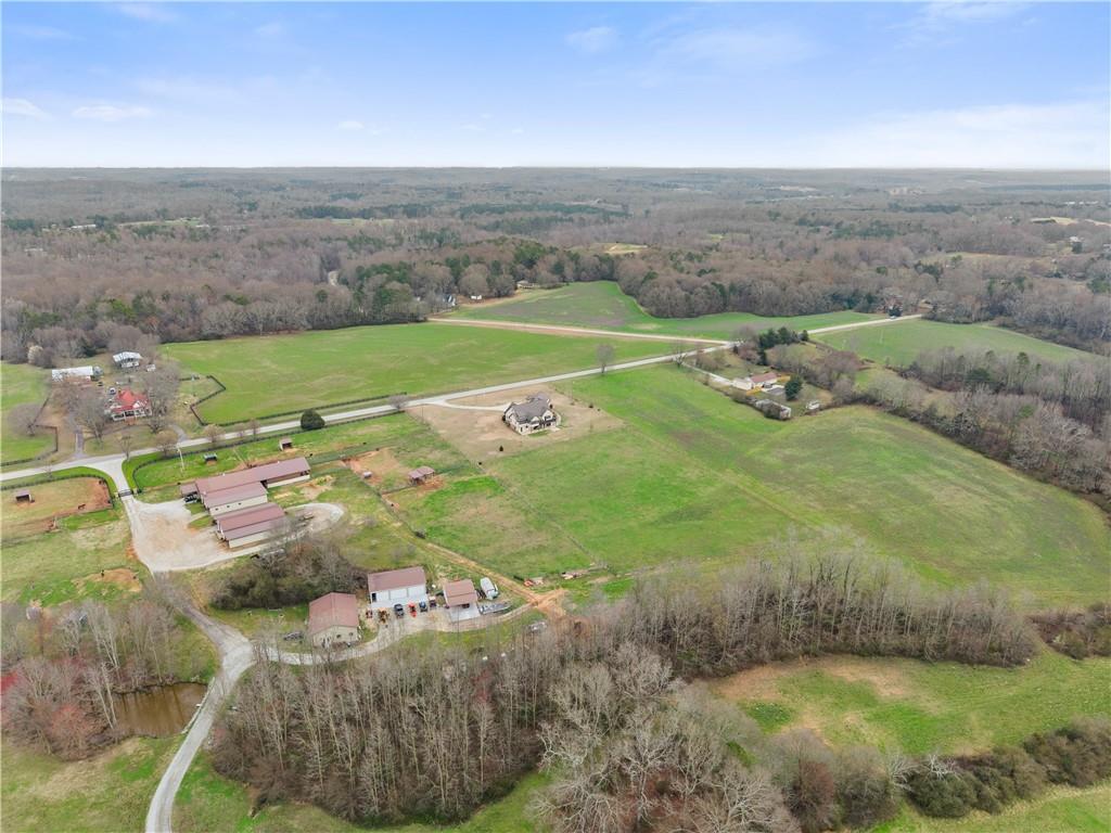 725 County Farm Road Jefferson, GA 30549 - Photo 65 of 66 a view of a golf course with an outdoor space