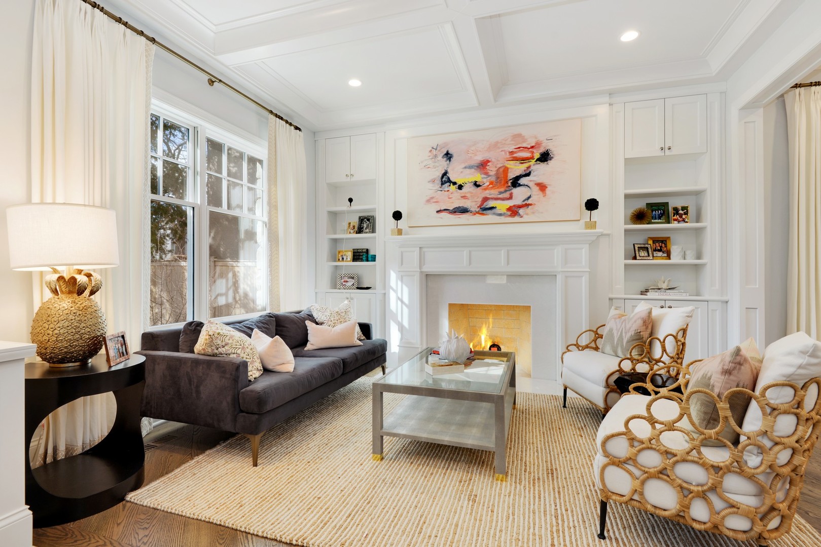 1003 Westmoor Road Winnetka, IL 60093 - Photo 2 of 38 a living room with furniture and a fireplace
