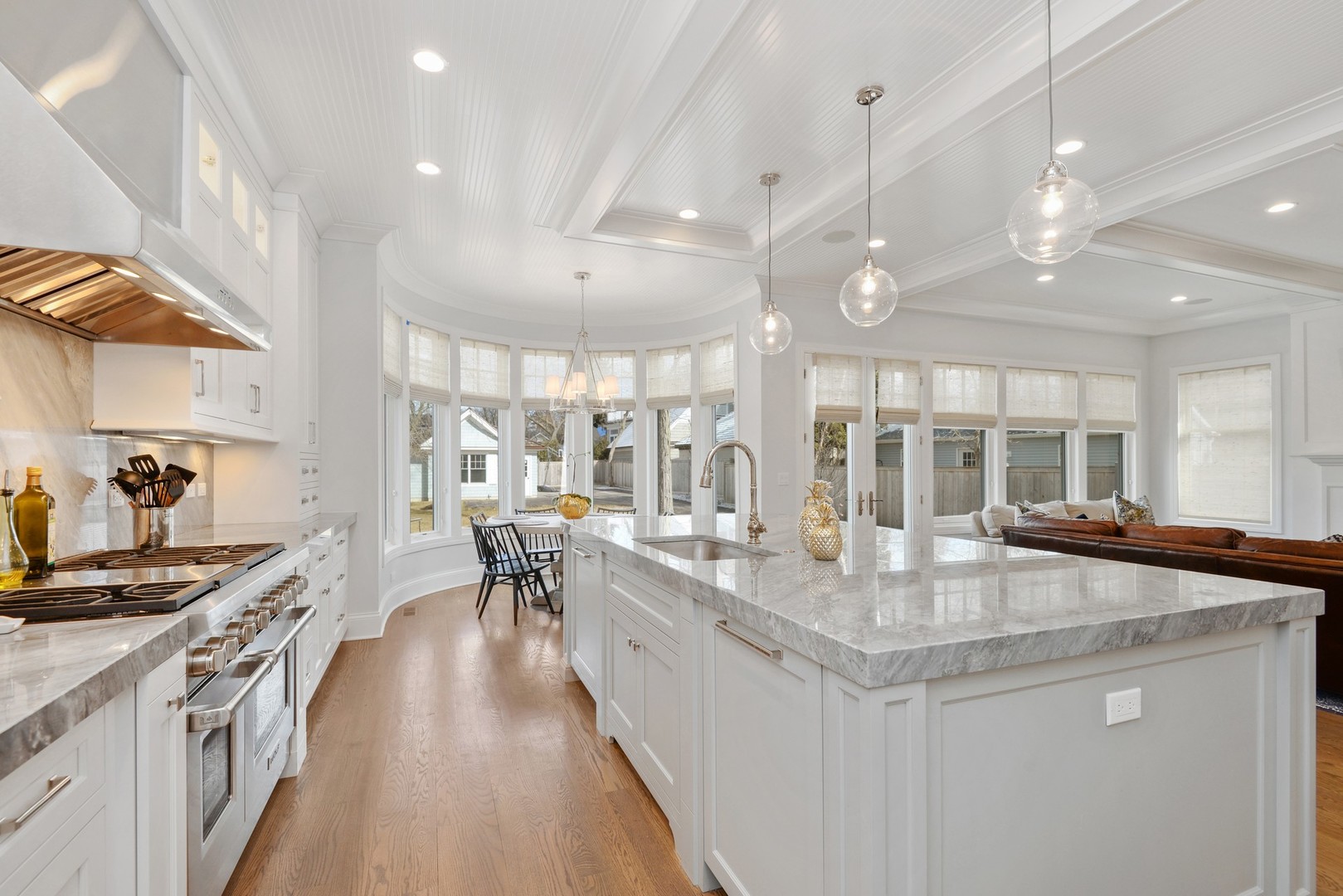 1003 Westmoor Road Winnetka, IL 60093 - Photo 13 of 38 a view of a kitchen with kitchen island granite countertop a large center island attached withe living room