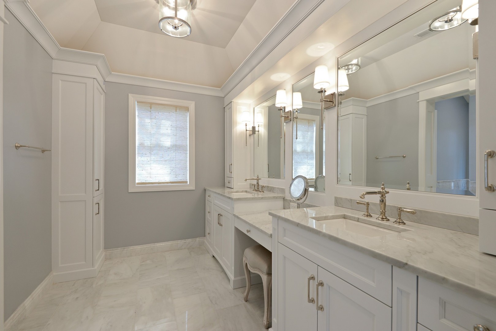 1003 Westmoor Road Winnetka, IL 60093 - Photo 16 of 38 a bathroom with a double vanity sink and a mirror