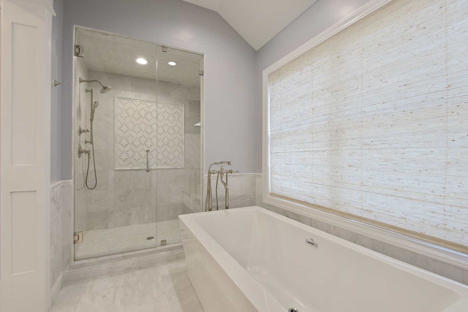 1003 Westmoor Road Winnetka, IL 60093 - Photo 17 of 38 a bathroom with a bathtub and a shower