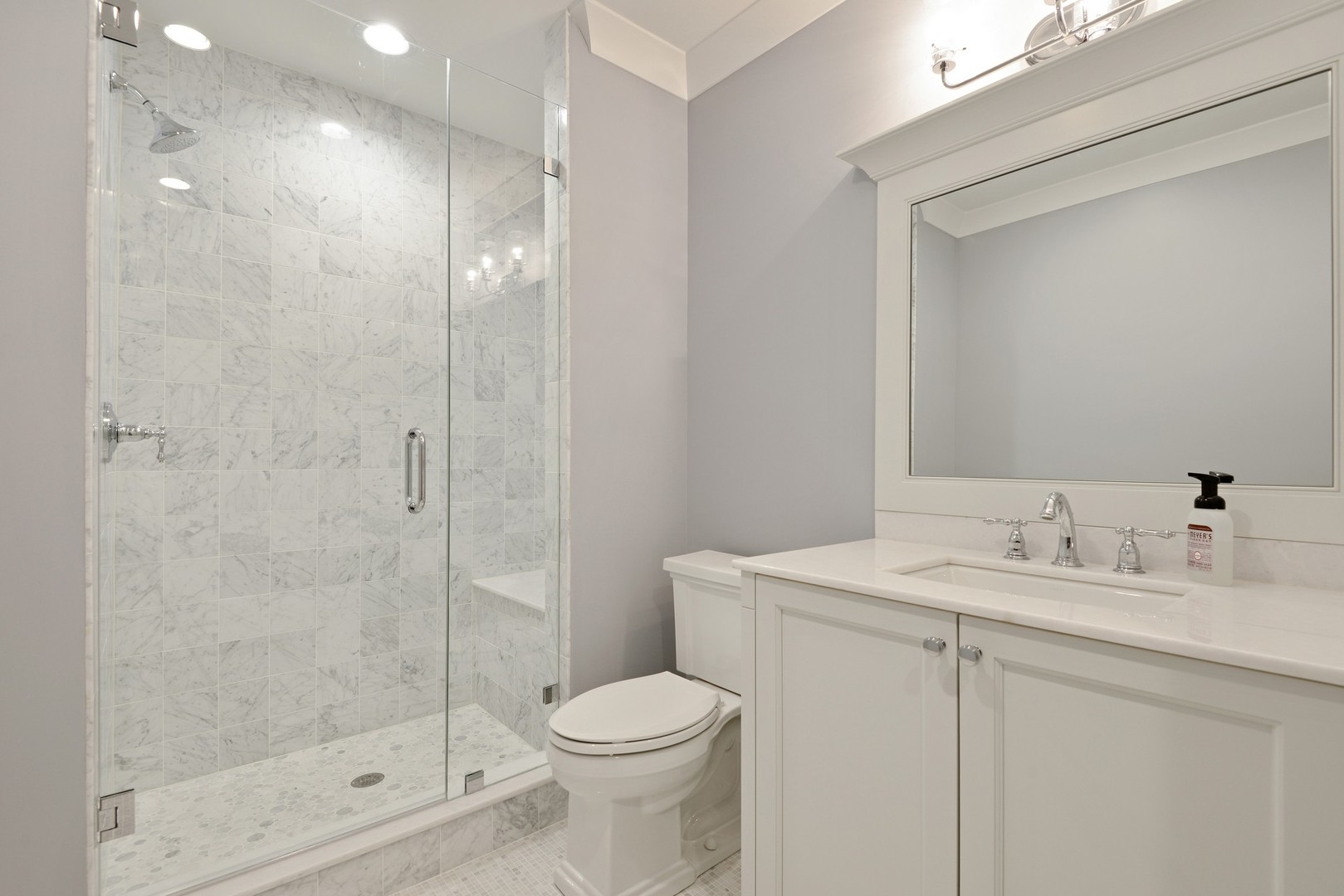 1003 Westmoor Road Winnetka, IL 60093 - Photo 25 of 38 a bathroom with a sink toilet and shower