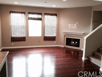 26 Paseo Del Rey San Clemente, CA 92673 - Photo 1 of 1 a view of empty room with wooden floor and fireplace