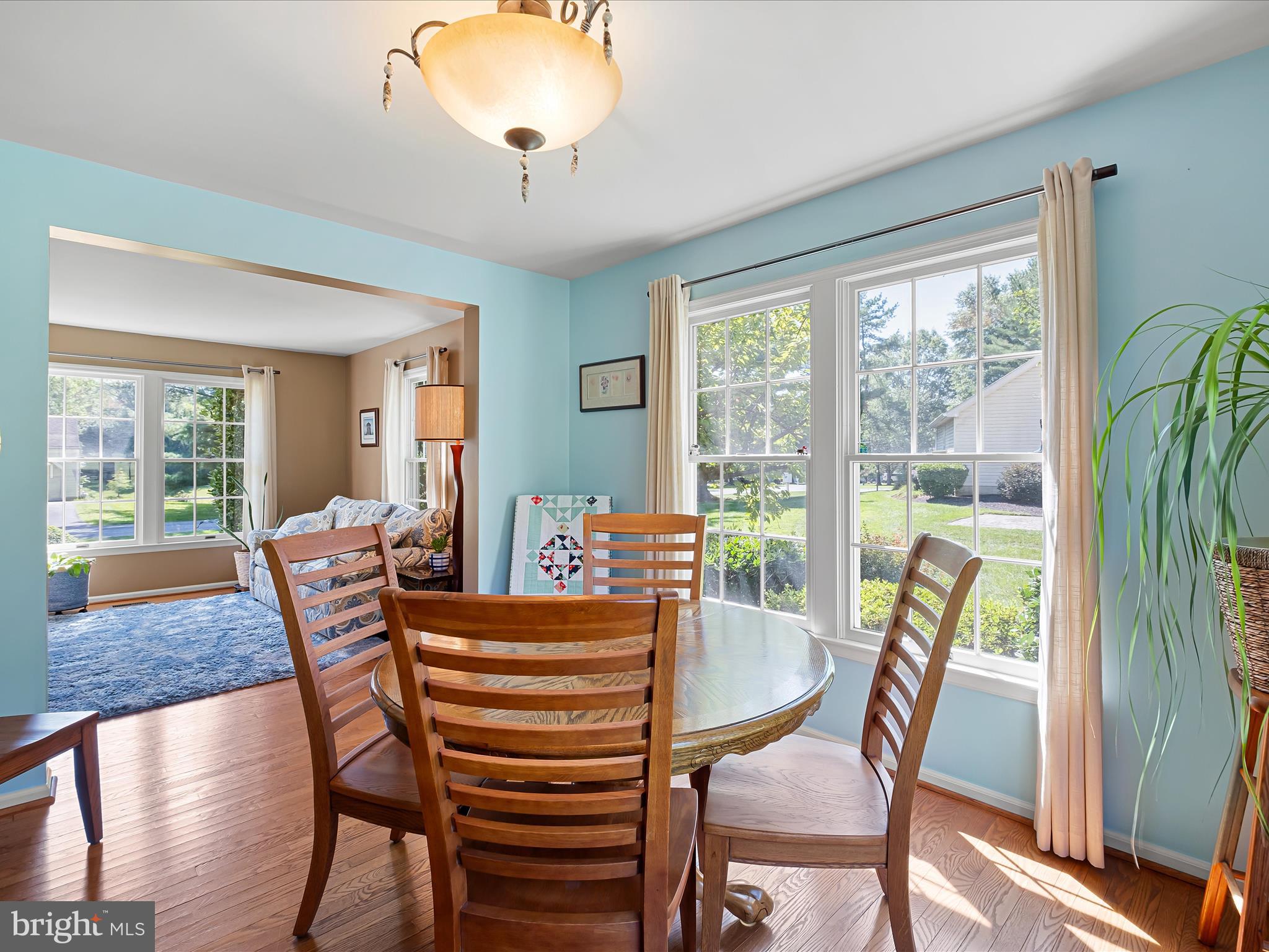 314 Edinburgh Road Chadds Ford, PA 19317 - Photo 12 of 29 a dining room with furniture a chandelier and wooden floor