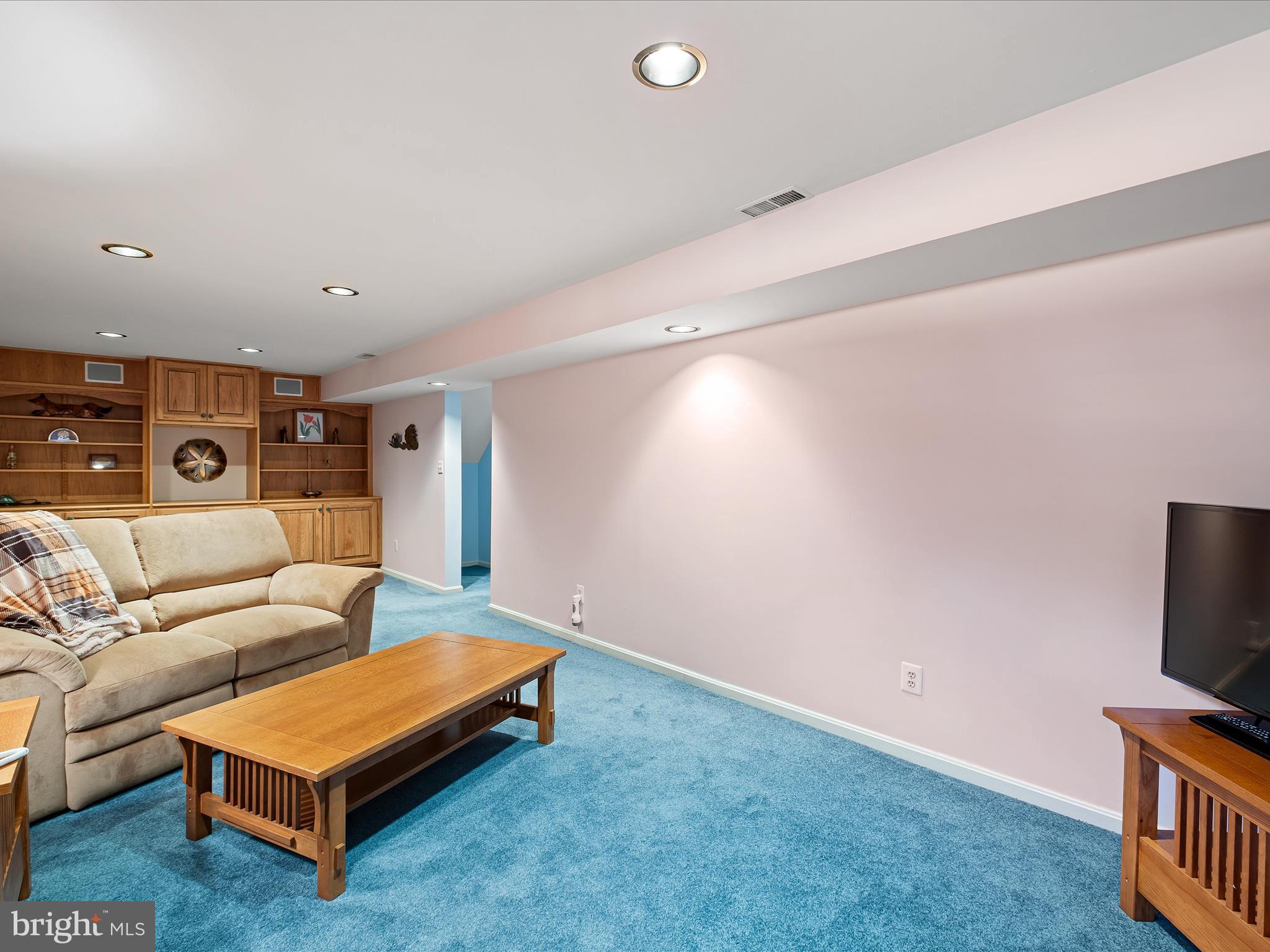 314 Edinburgh Road Chadds Ford, PA 19317 - Photo 19 of 29 a living room with furniture and a flat screen tv