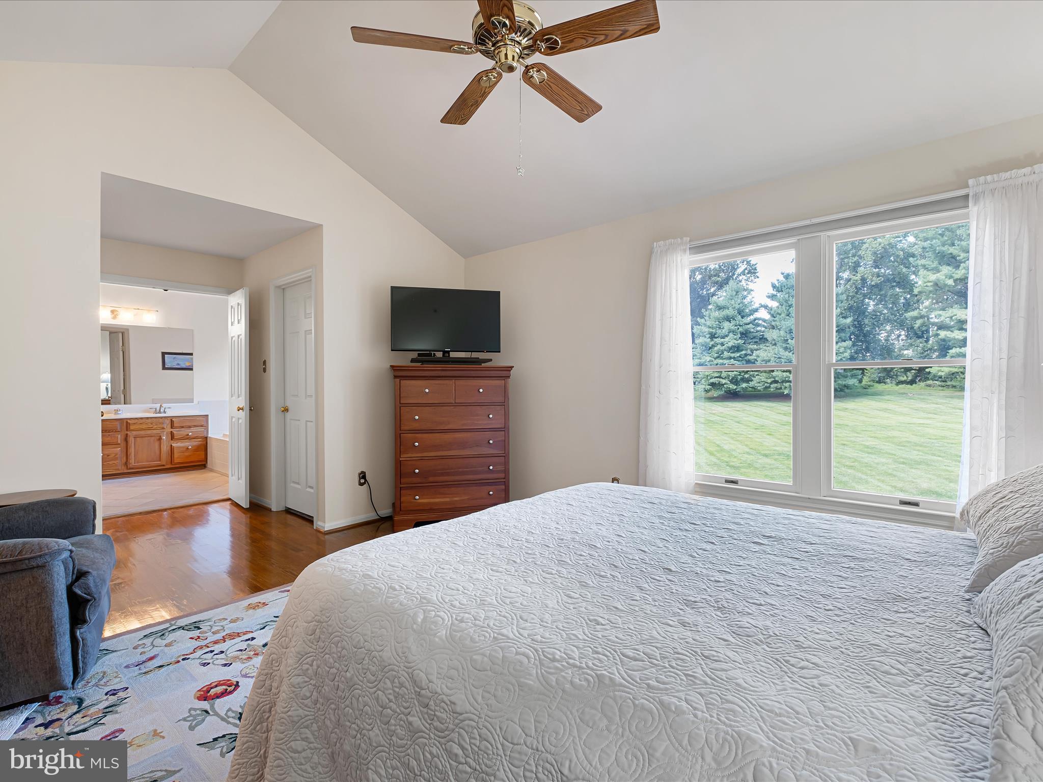 314 Edinburgh Road Chadds Ford, PA 19317 - Photo 23 of 29 a bedroom with a bed and a large window