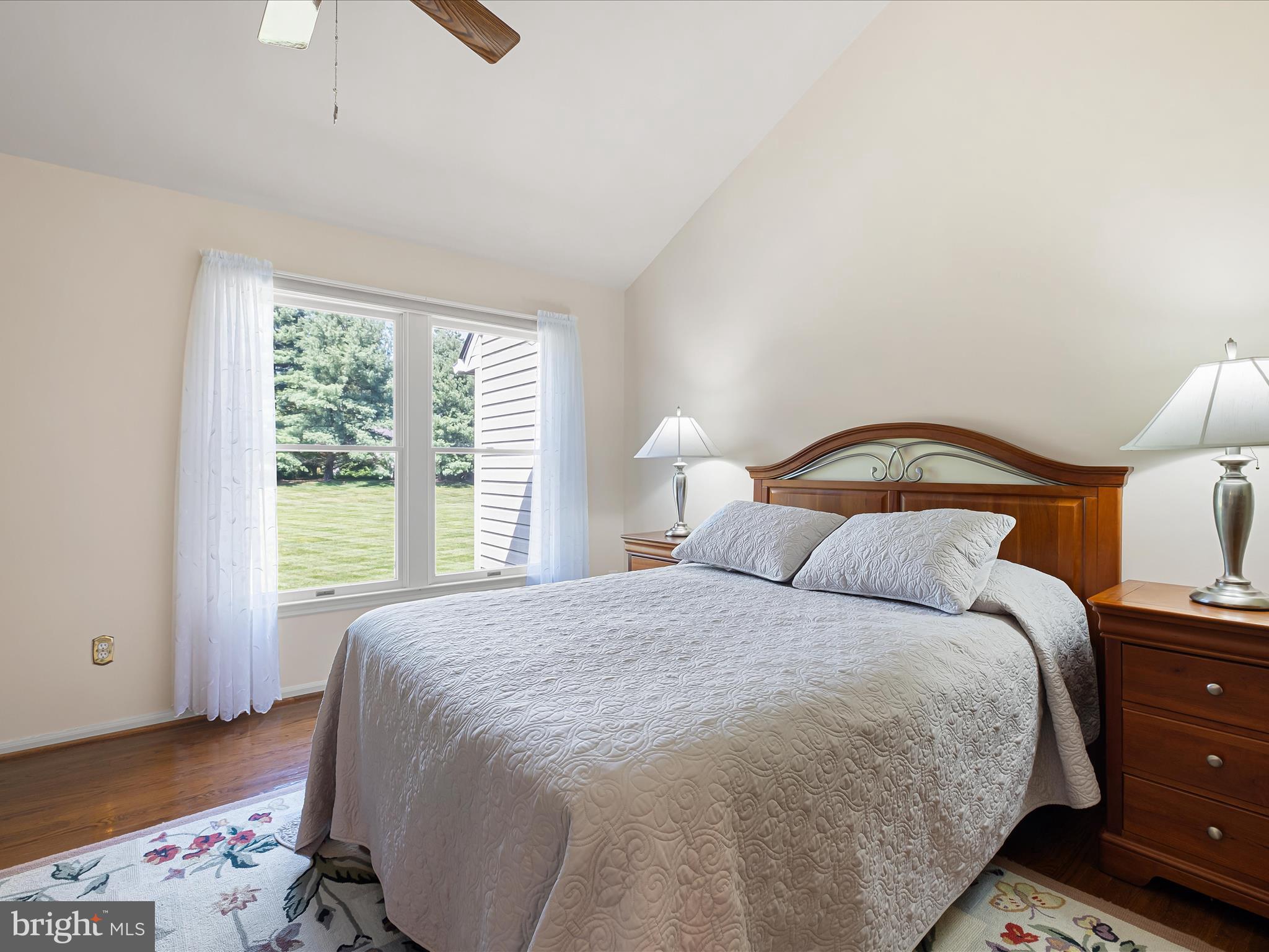314 Edinburgh Road Chadds Ford, PA 19317 - Photo 24 of 29 a bedroom with a bed and wooden floor