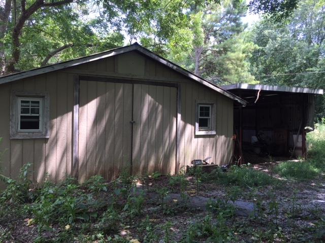 4129 Sulphur Springs Road Murfreesboro, TN 37129 - Photo 10 of 11 a backyard of a house with lots of green space