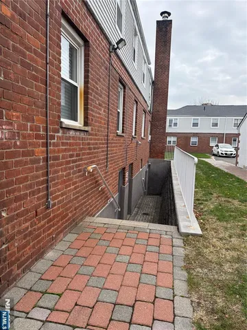 a view of balcony with wooden floor