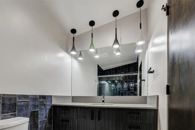 a kitchen with a counter space a sink and appliances
