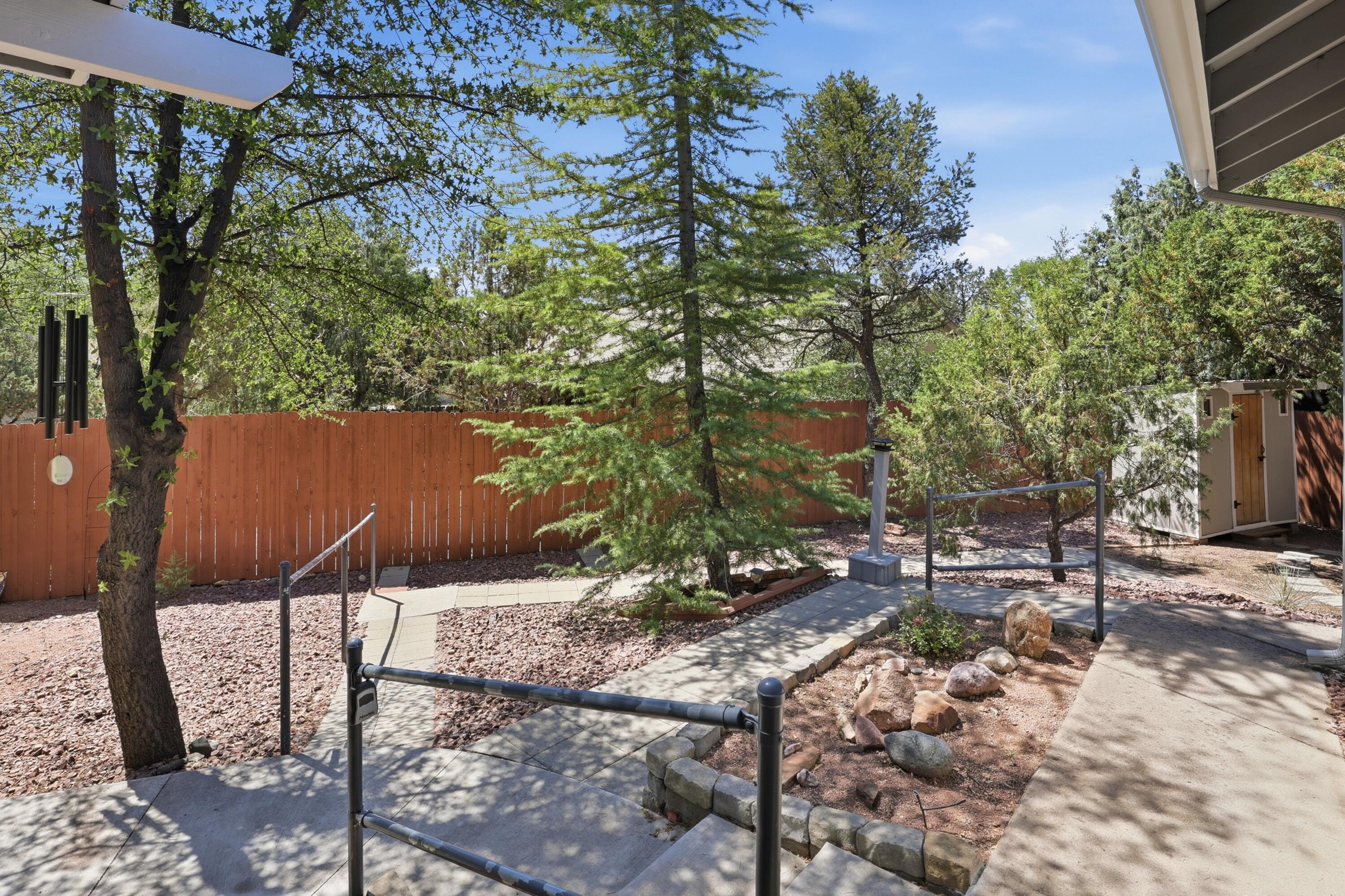 910 West Wagon Trail Payson, AZ 85541 - Photo 35 of 35 a backyard of a house with lots of green space