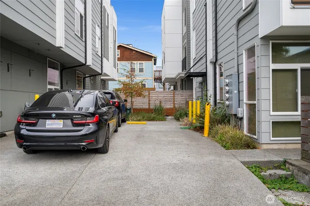 a view of a car park in front of building