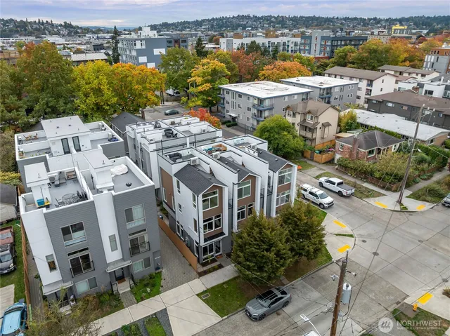an aerial view of a house with a lake view
