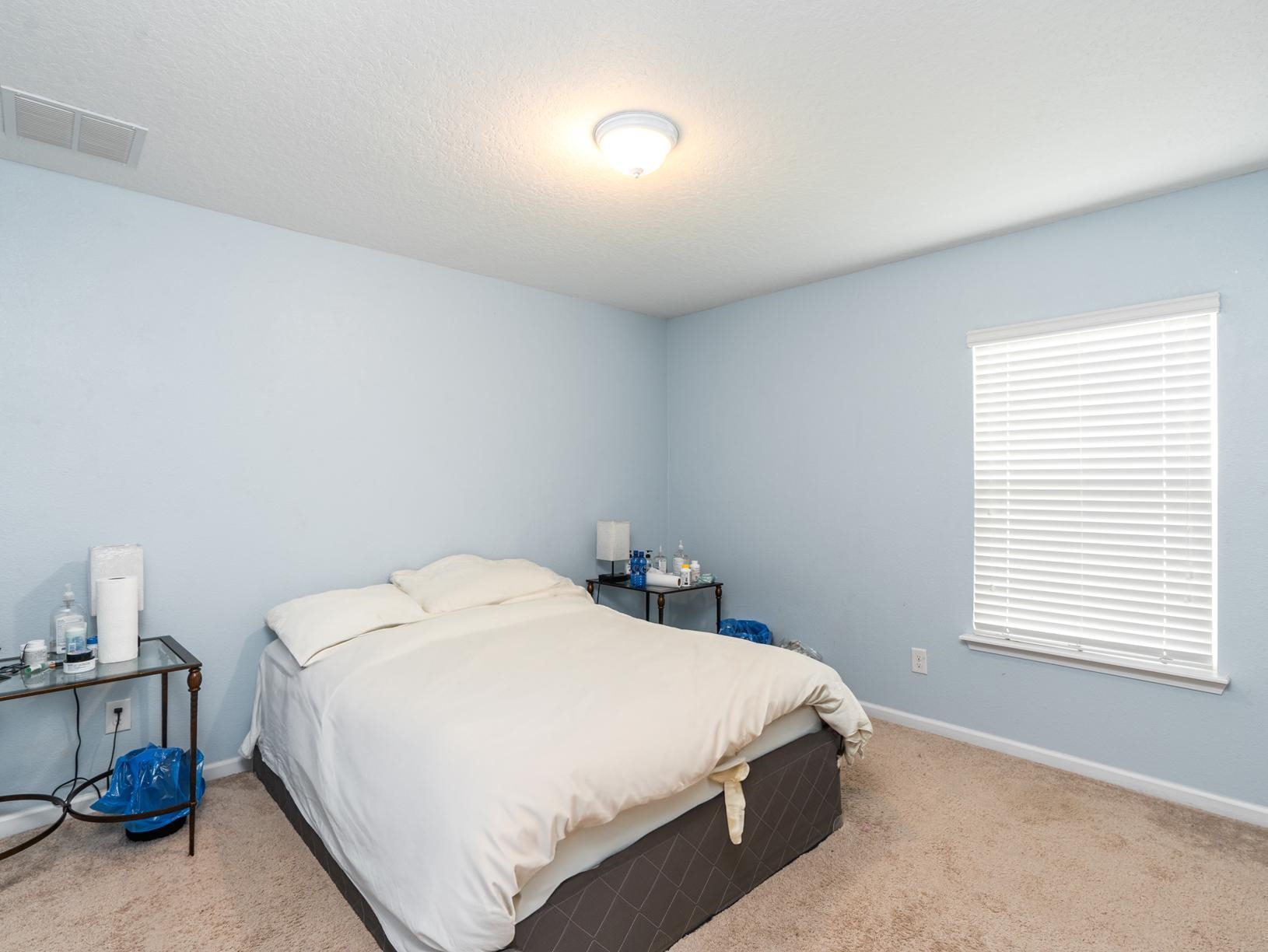 178 South Hamilton Springs Road St. Augustine, FL 32084 - Photo 13 of 26 a bedroom with a bed and a window