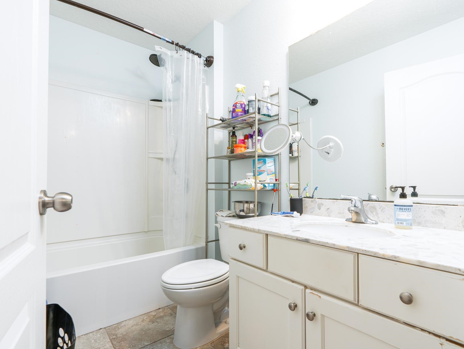 178 South Hamilton Springs Road St. Augustine, FL 32084 - Photo 14 of 26 a bathroom with a sink a toilet and shower