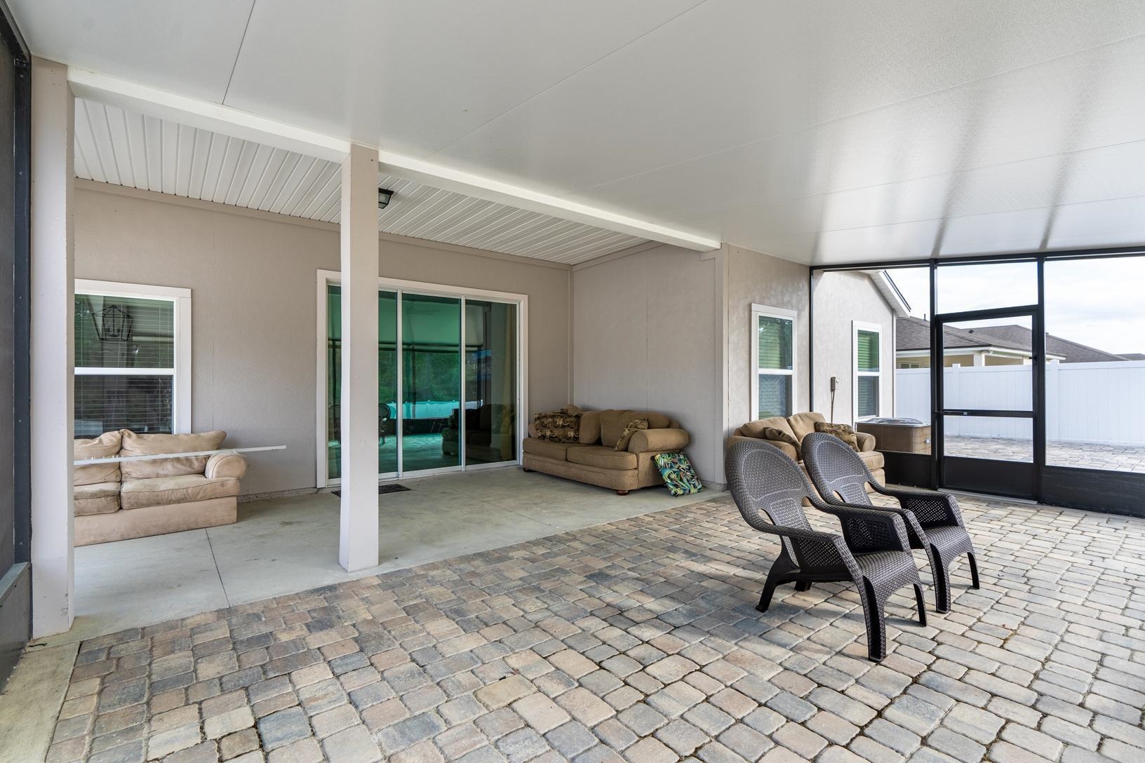 178 South Hamilton Springs Road St. Augustine, FL 32084 - Photo 20 of 26 a living room with furniture and a large window