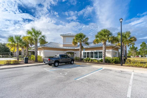a view of a park with large trees