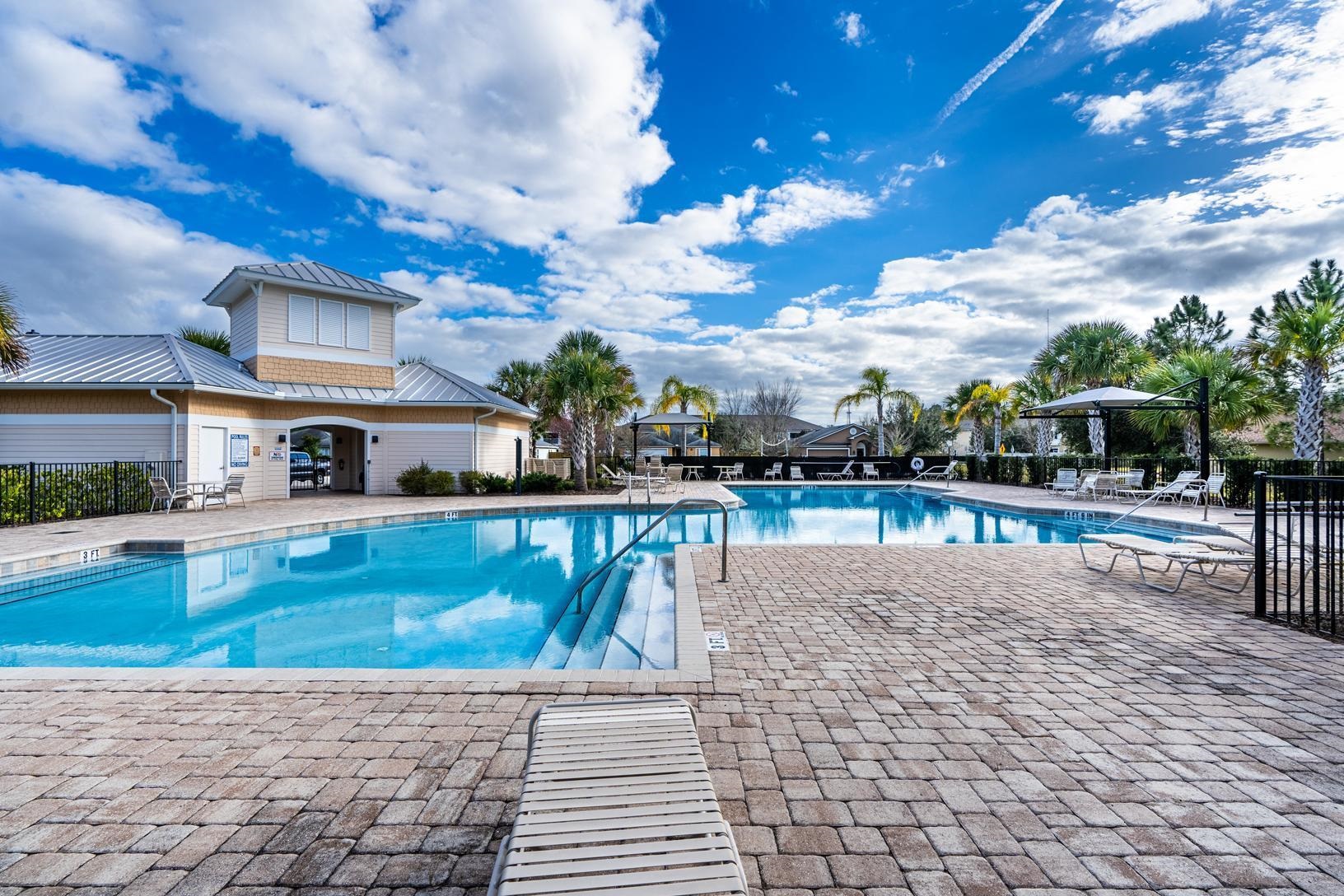 178 South Hamilton Springs Road St. Augustine, FL 32084 - Photo 26 of 26 a swimming pool with outdoor seating