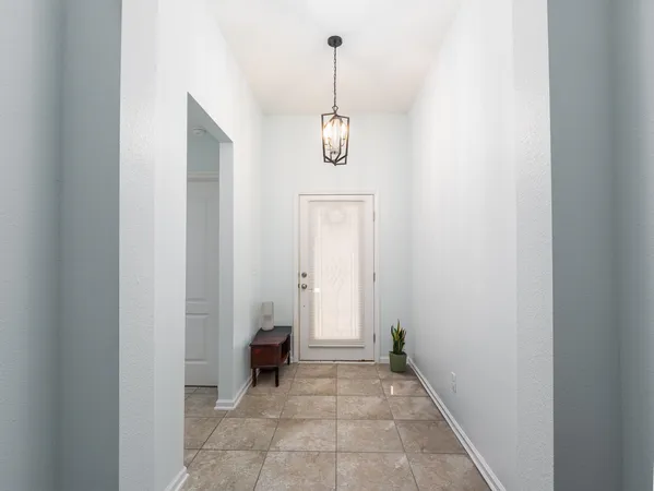 a kitchen with stainless steel appliances a stove sink and refrigerator