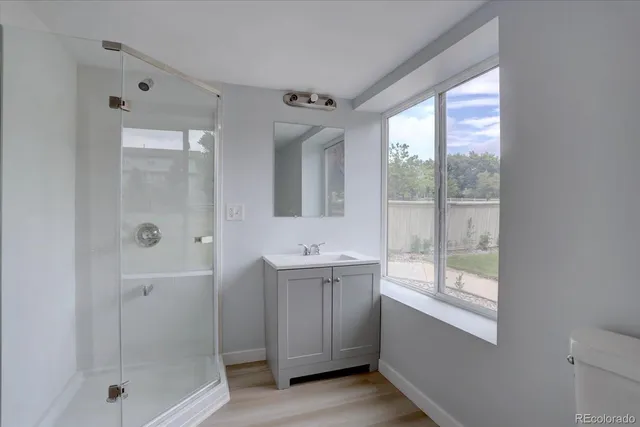 a bathroom with a bathtub and a sink