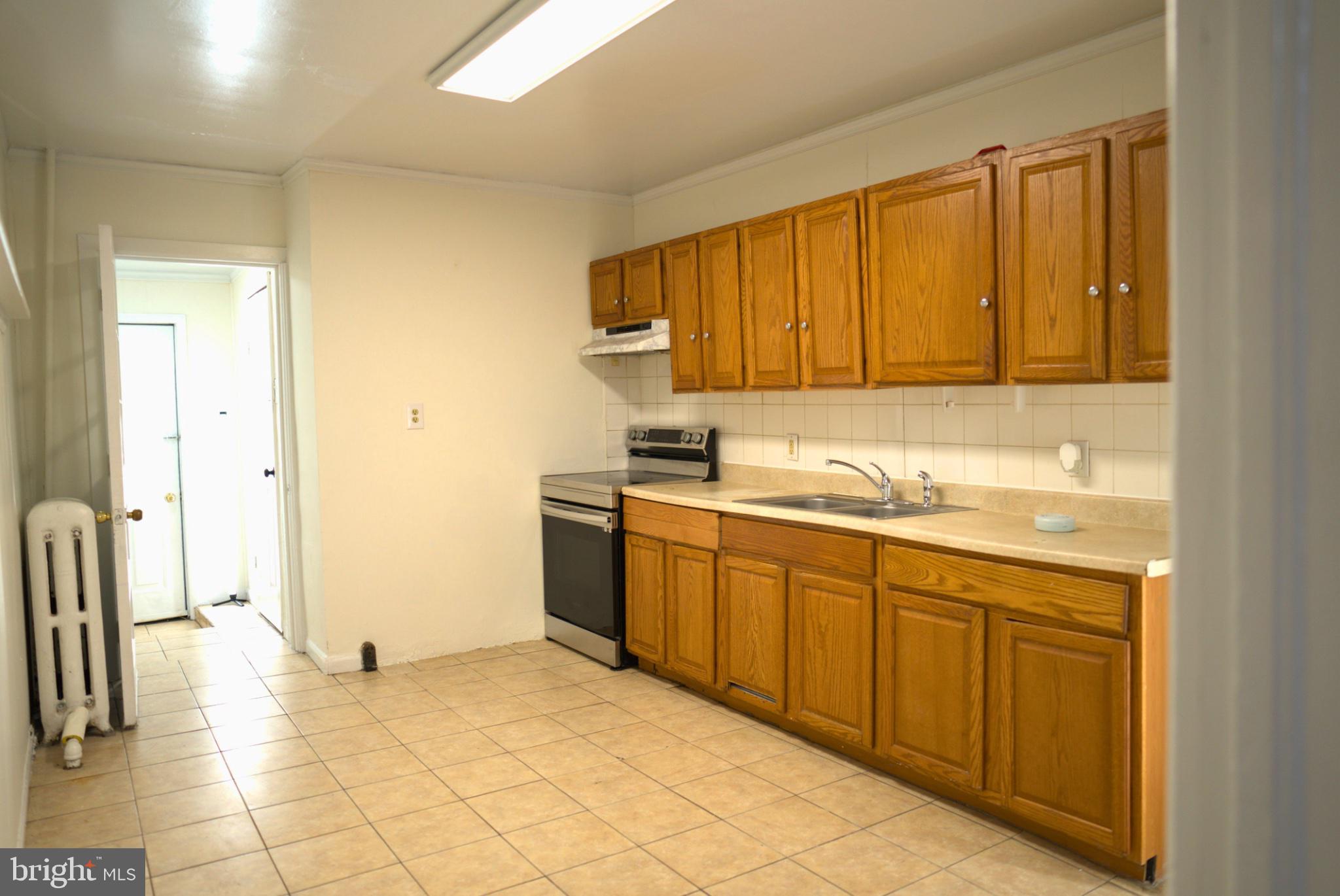 74 South Cedar Street Hazleton, PA 18201 - Photo 8 of 15 Bright and spacious kitchen retreat.