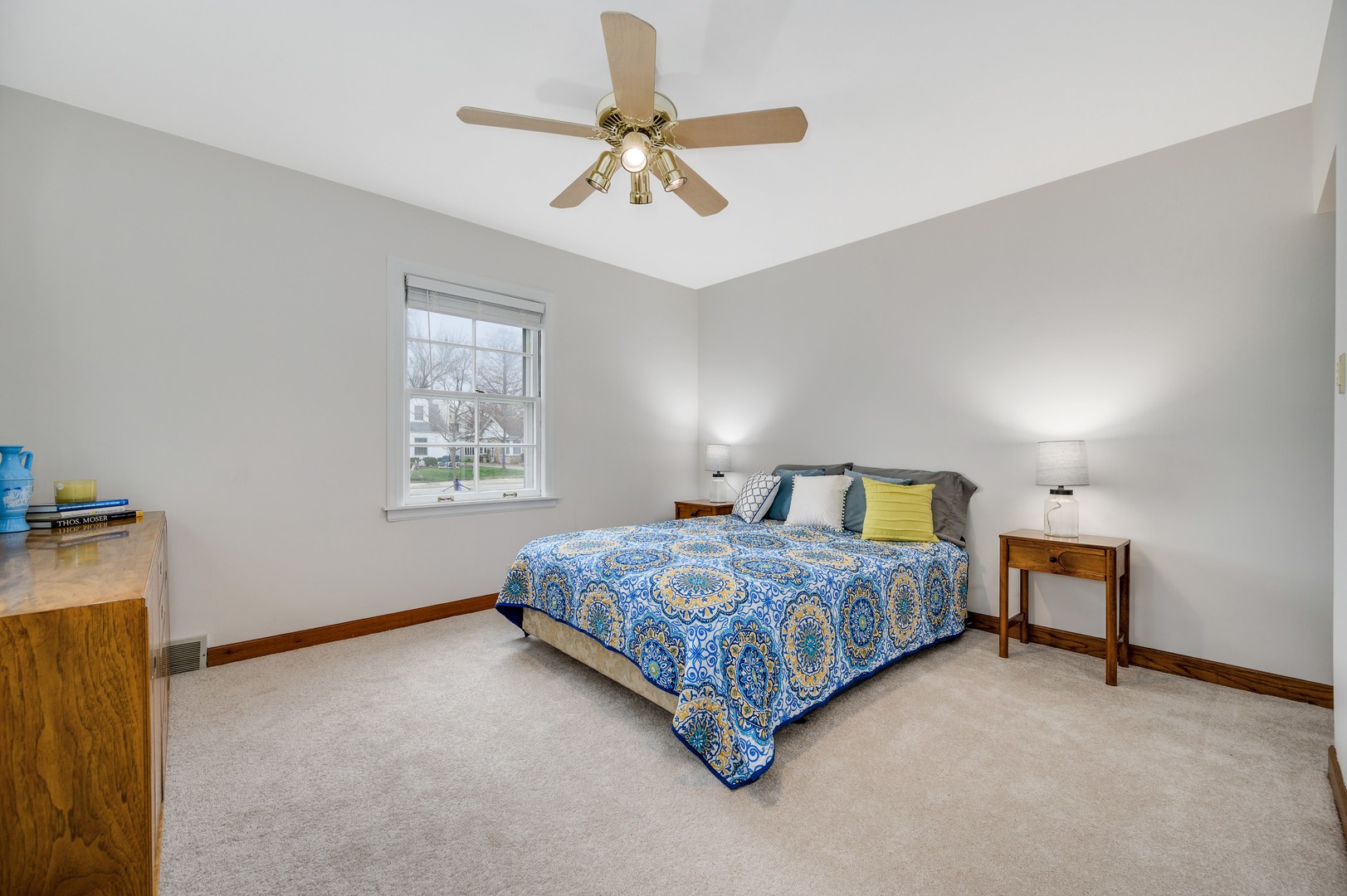 1924 Linneman Street Glenview, IL 60025 - Photo 14 of 24 a bedroom with a bed chandelier and a window