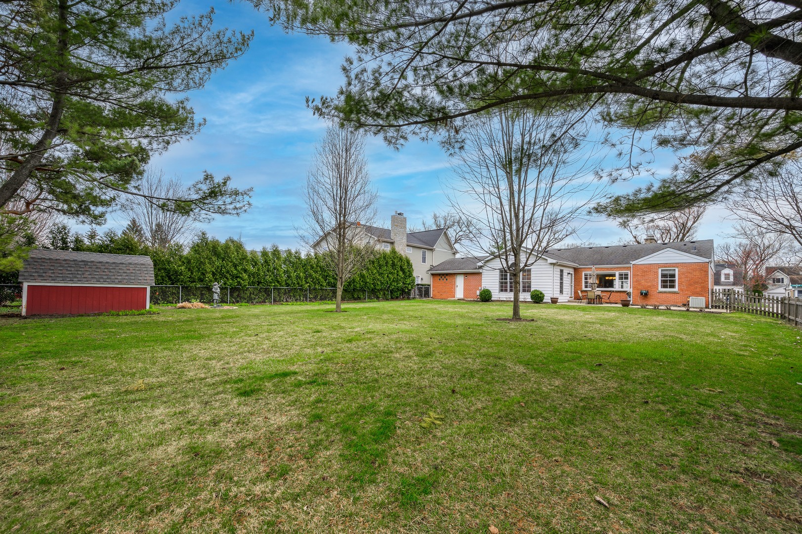1924 Linneman Street Glenview, IL 60025 - Photo 20 of 24 a view of a house with a yard