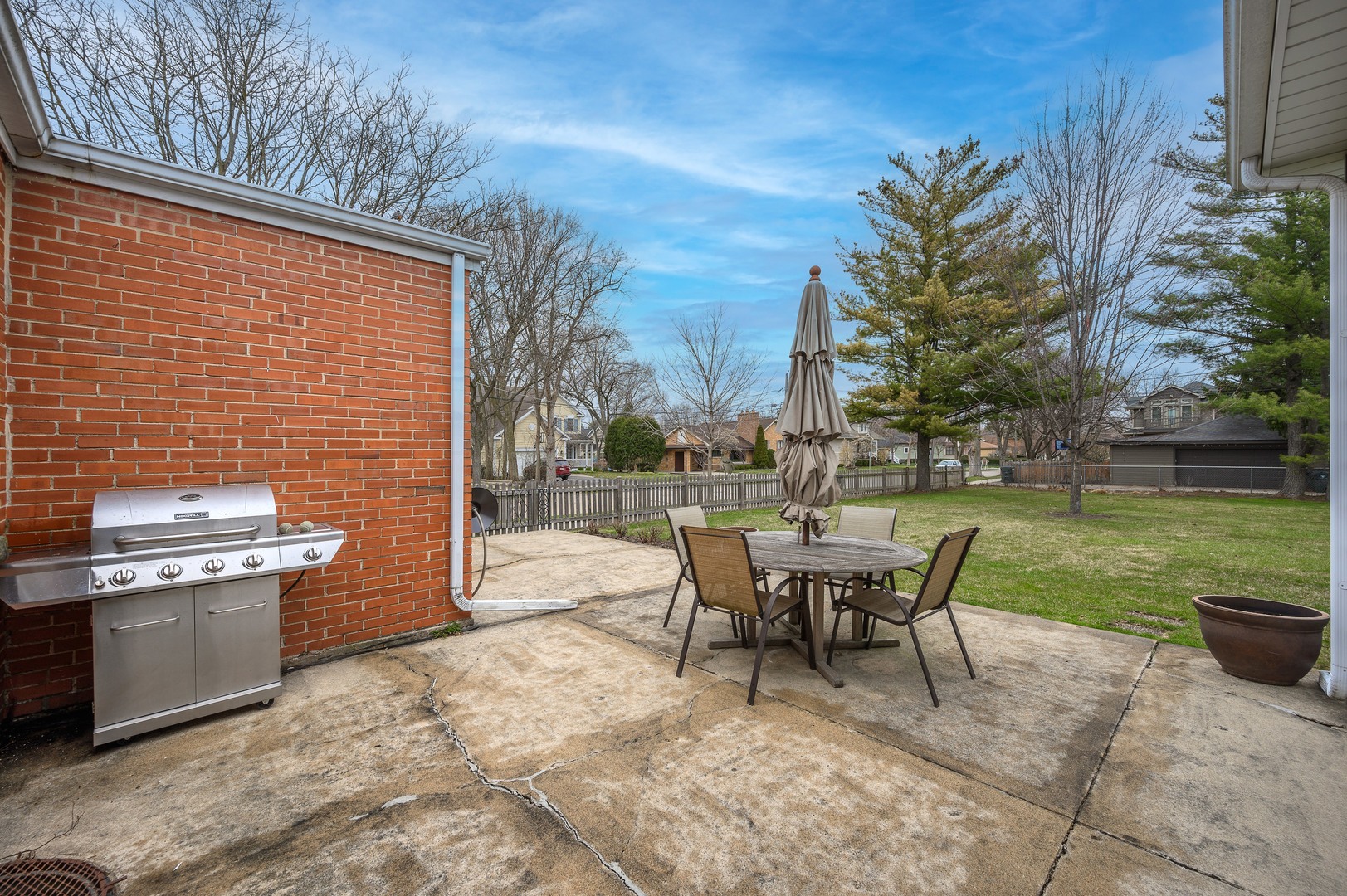 1924 Linneman Street Glenview, IL 60025 - Photo 22 of 24 a backyard of a house with outdoor seating