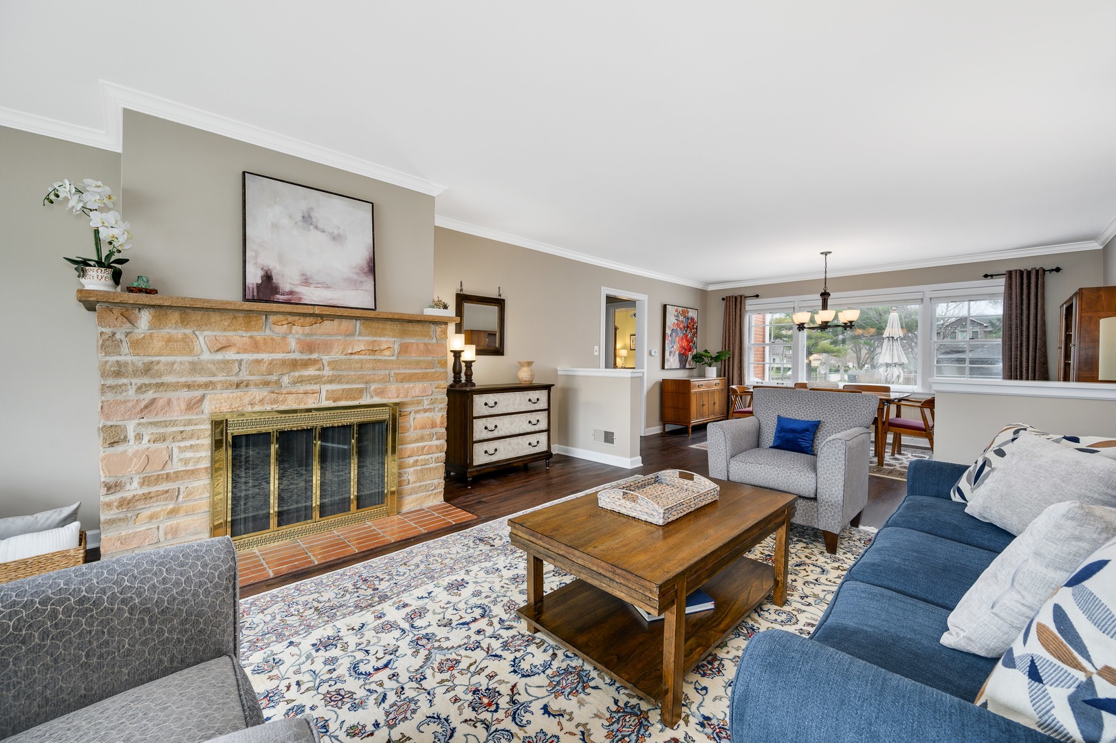 1924 Linneman Street Glenview, IL 60025 - Photo 3 of 24 a living room with furniture and a fireplace